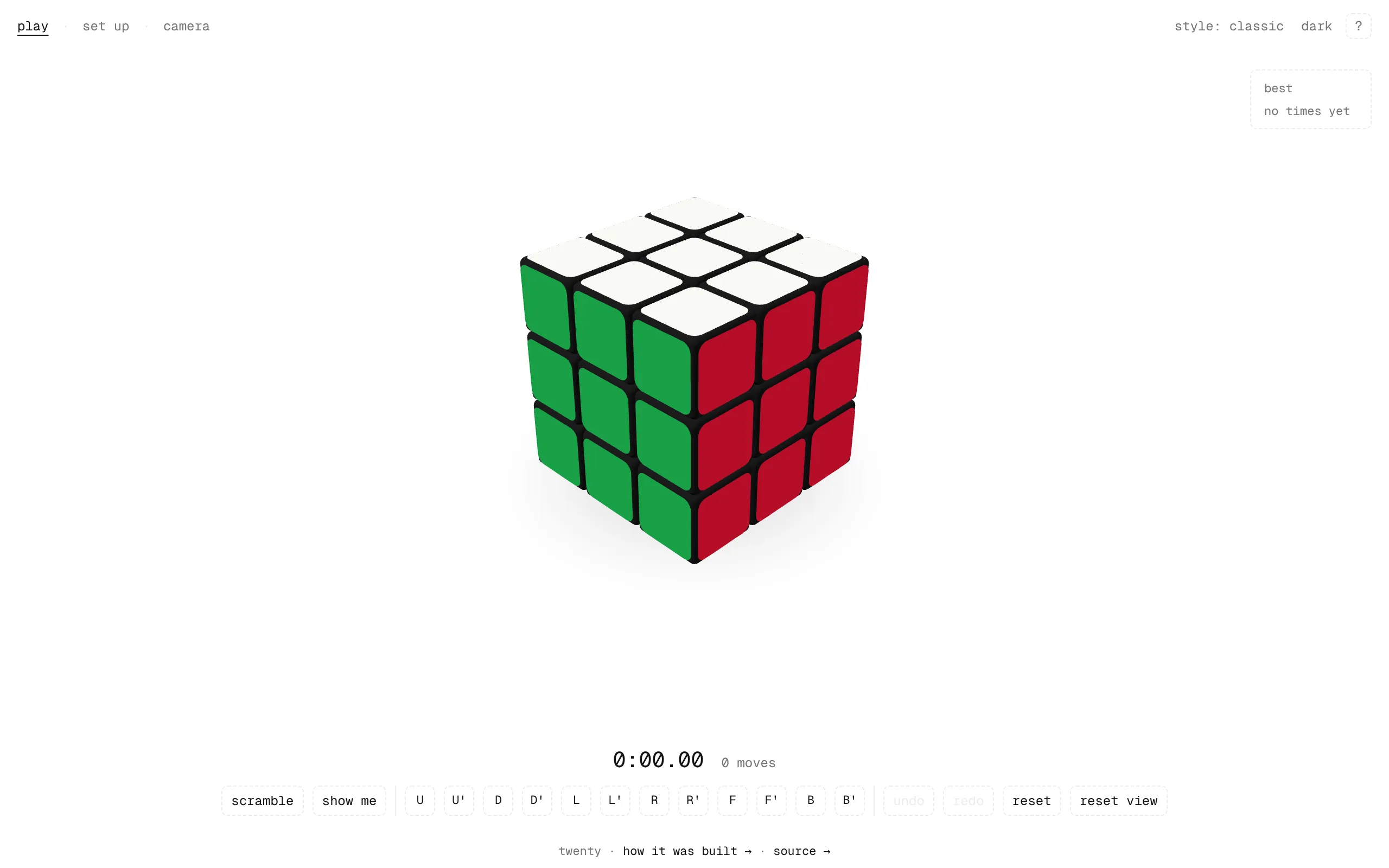 A 3D Rubik's cube on a white page, solved, with white on top, green in front and red on the right, under the tabs play, set up and camera, and a style picker and theme toggle on the right.