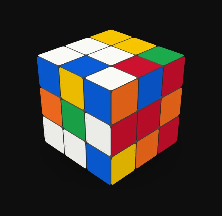 The scrambled cube in the stickerless style with the lights off